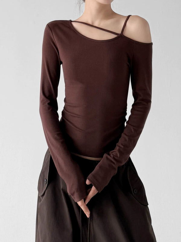 Brown long-sleeve top, front hands view