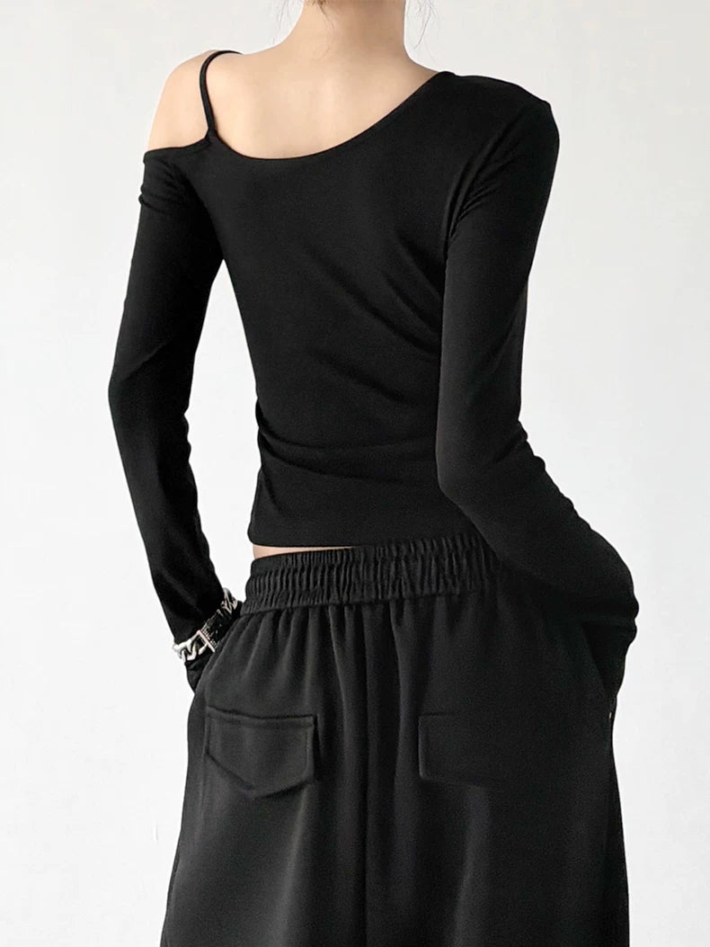 Black cross strap asymmetric top, back view