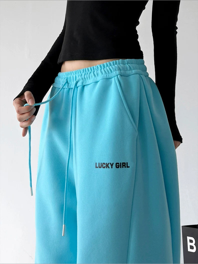 Blue waist detail view of wide-leg pants
