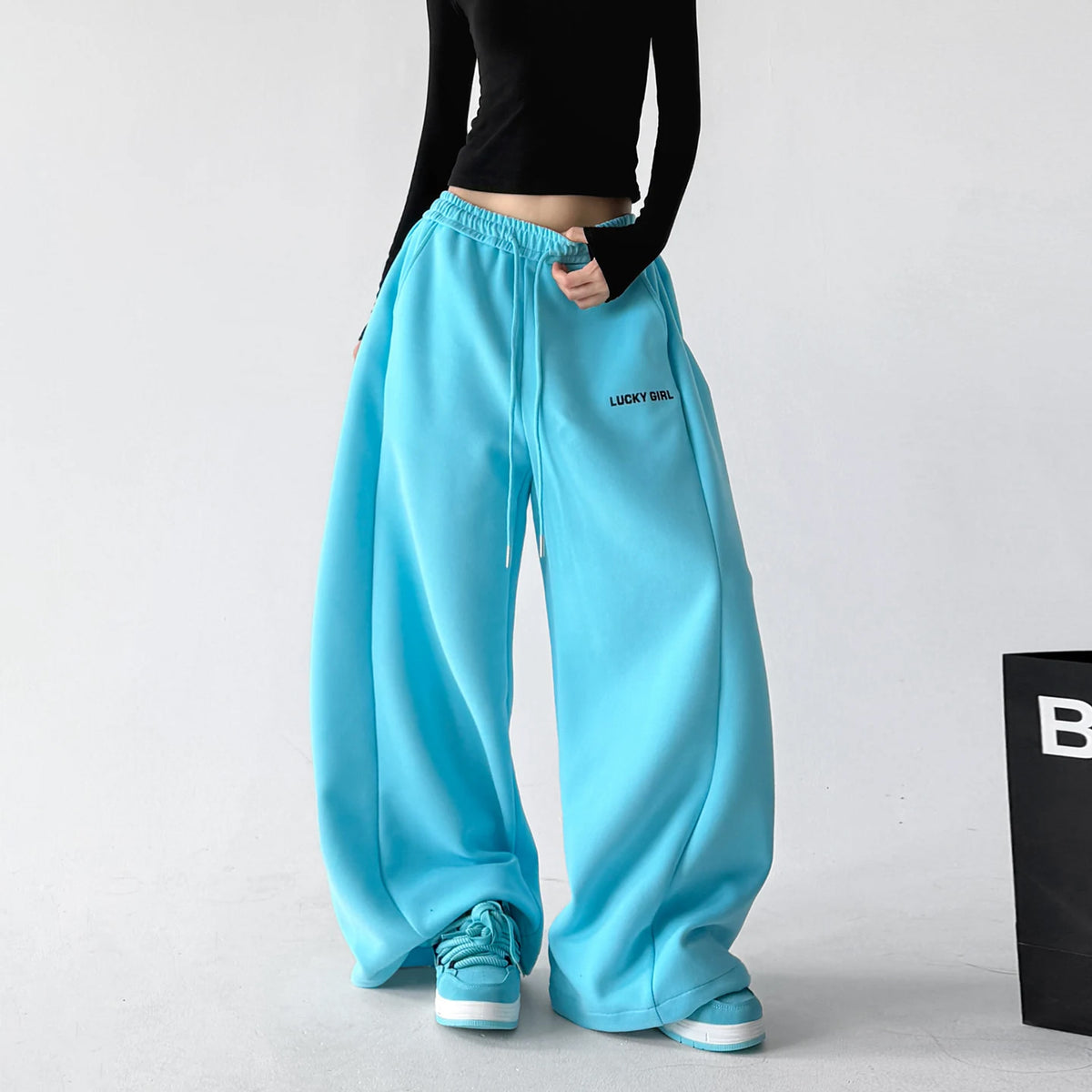 Blue wide-leg pants, front view