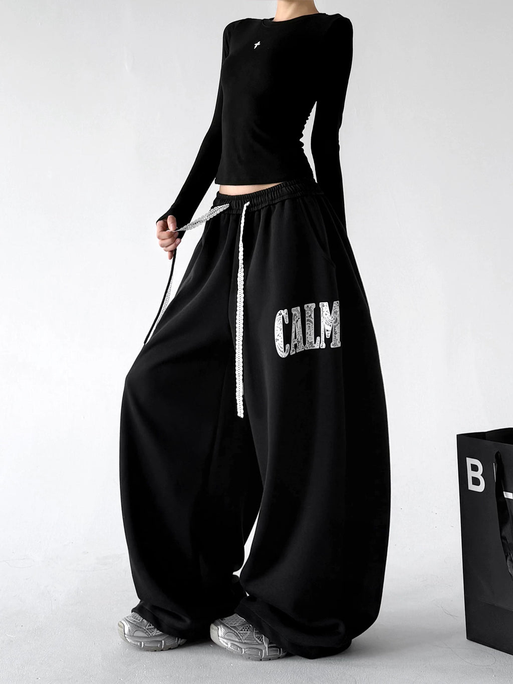 Black pants, angled front view