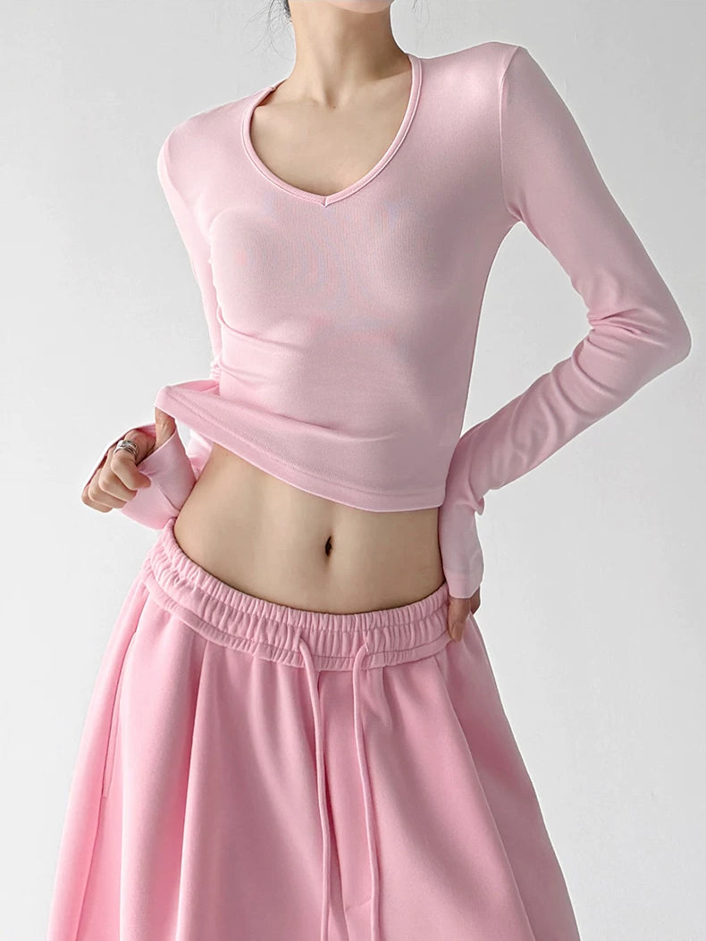 Petal Pink v neck crop top, angled front view