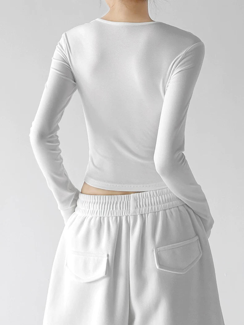 White v neck crop top, back view