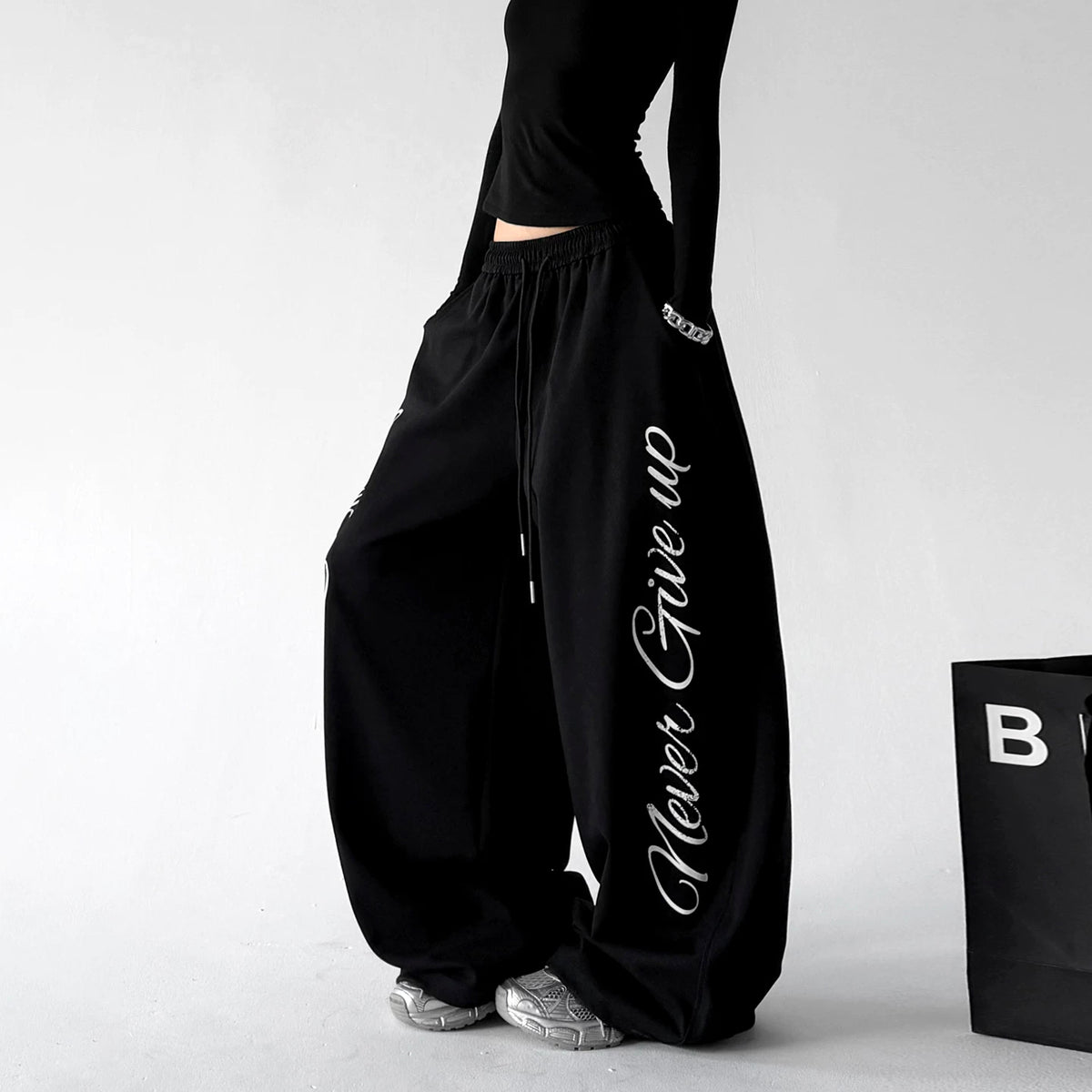 Black wide leg pants, side view