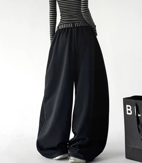 Black striped tie wide leg pants, back view