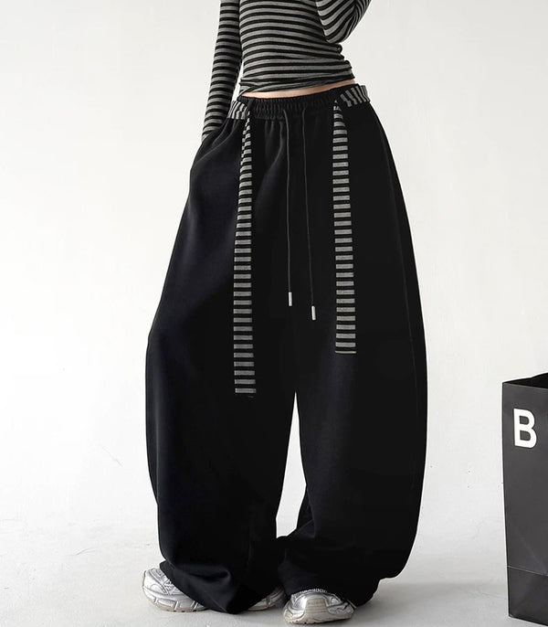 Black striped tie wide leg pants, front view