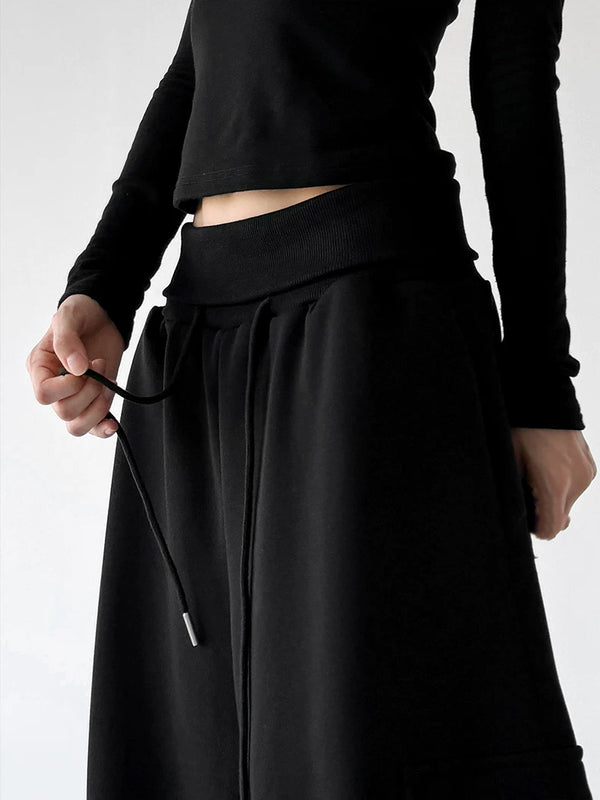 Black wide leg pants, waist detail view
