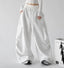 White wide leg pants, angled front view