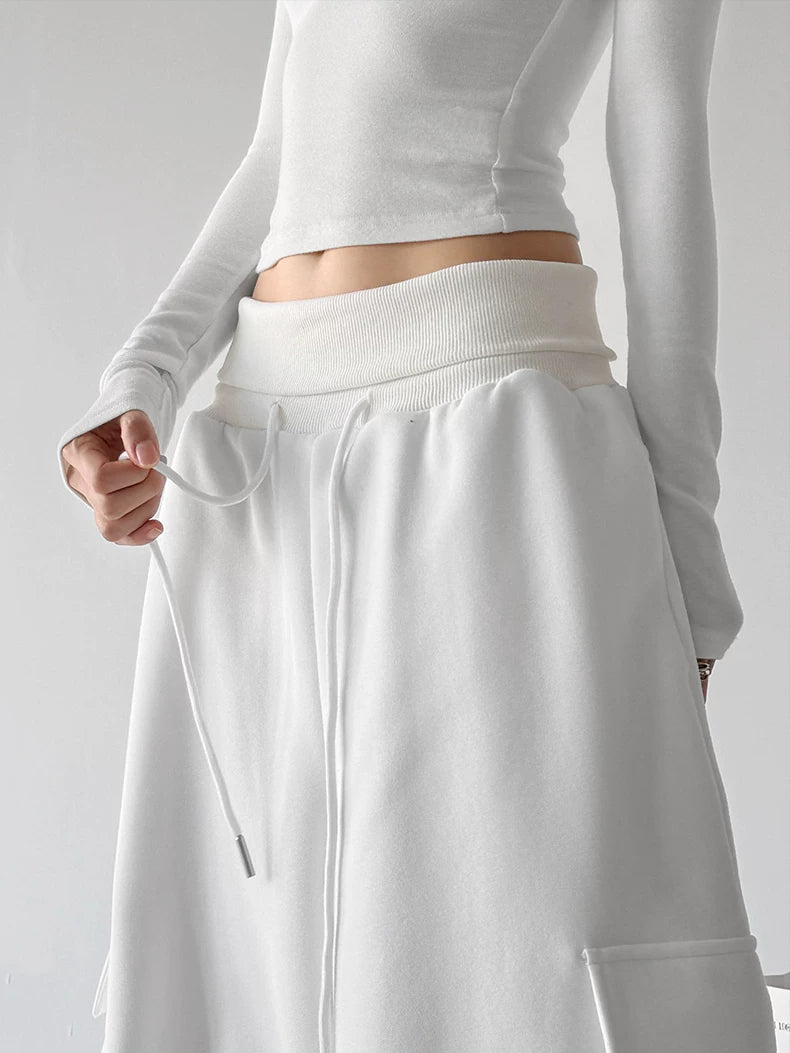 White wide leg pants, waist detail view