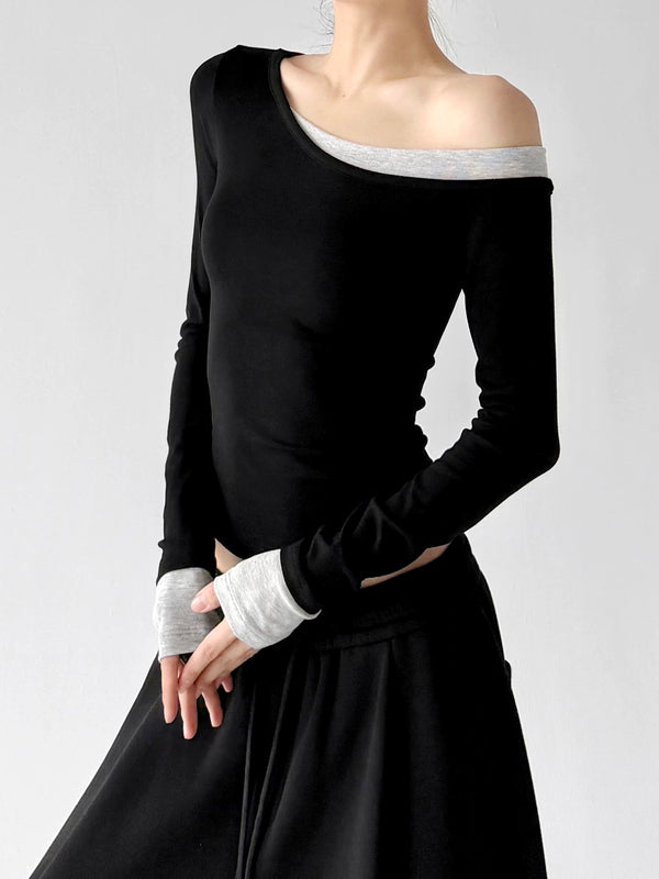 Black Gray contrast cuff asymmetric top, angled front view