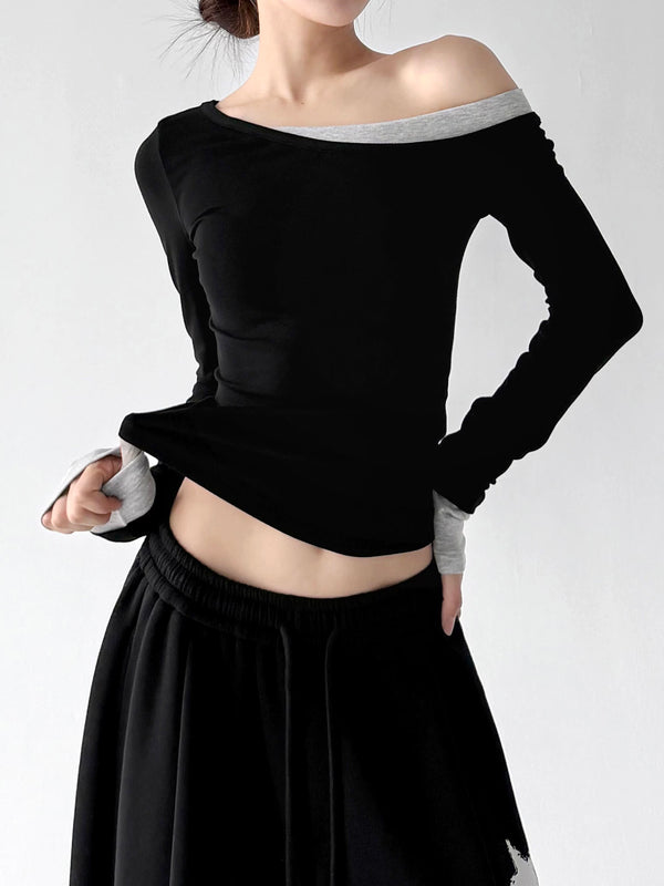Black Gray contrast cuff asymmetric top, hem detail view