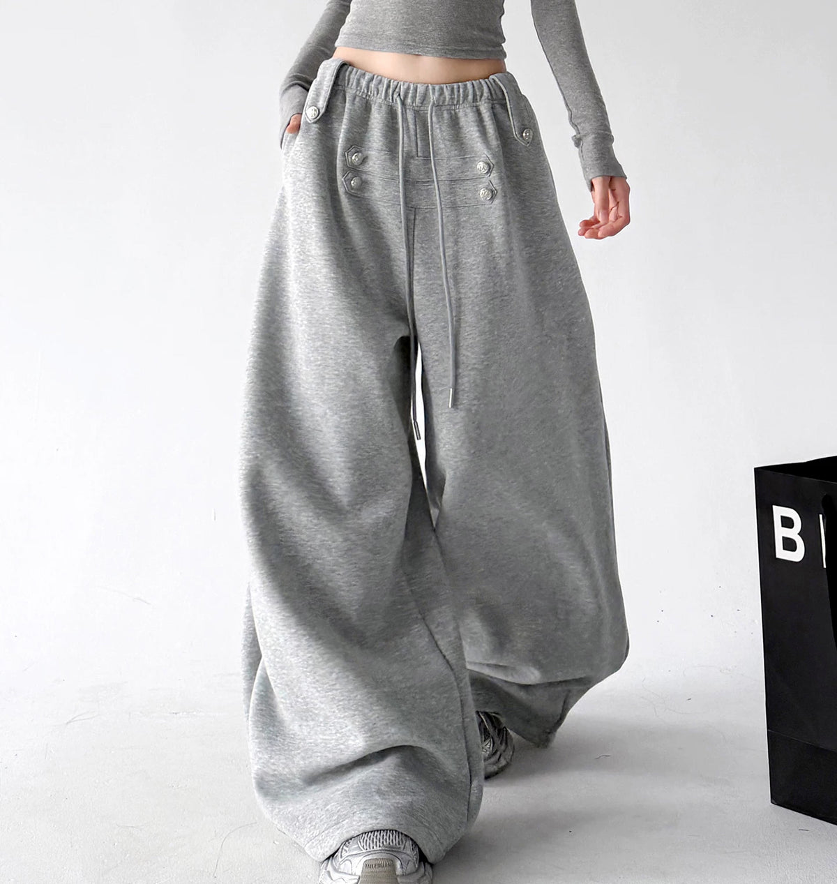 Gray decorative-button wide-leg pants walking view - CT66292