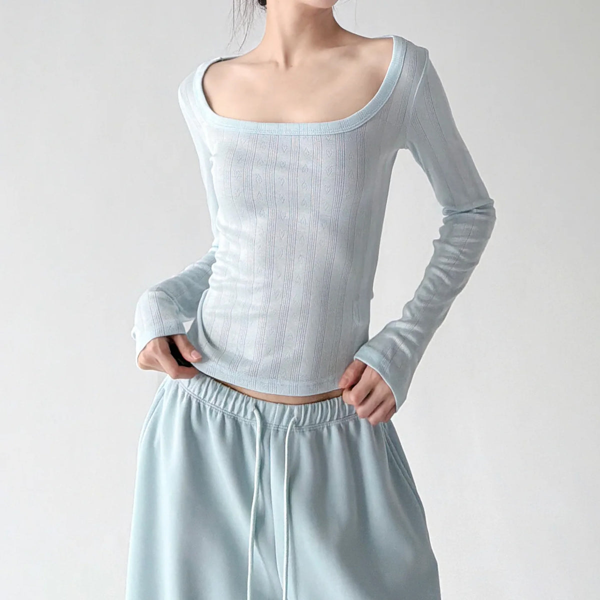 Blue ribbed scoop-neck top front hands - CT66295