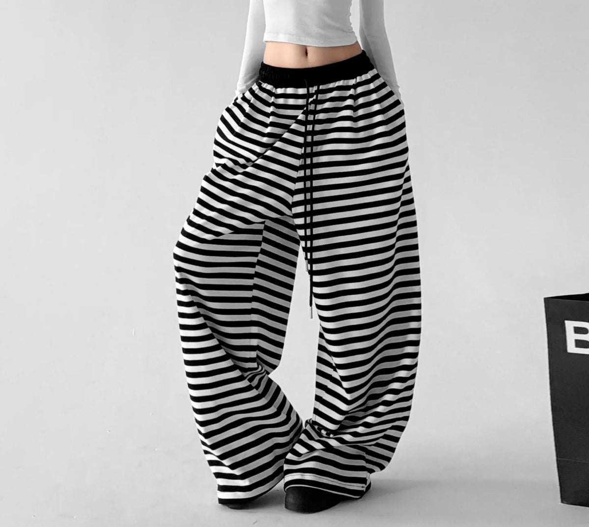 Black White striped wide-leg pants angled front - CT66298