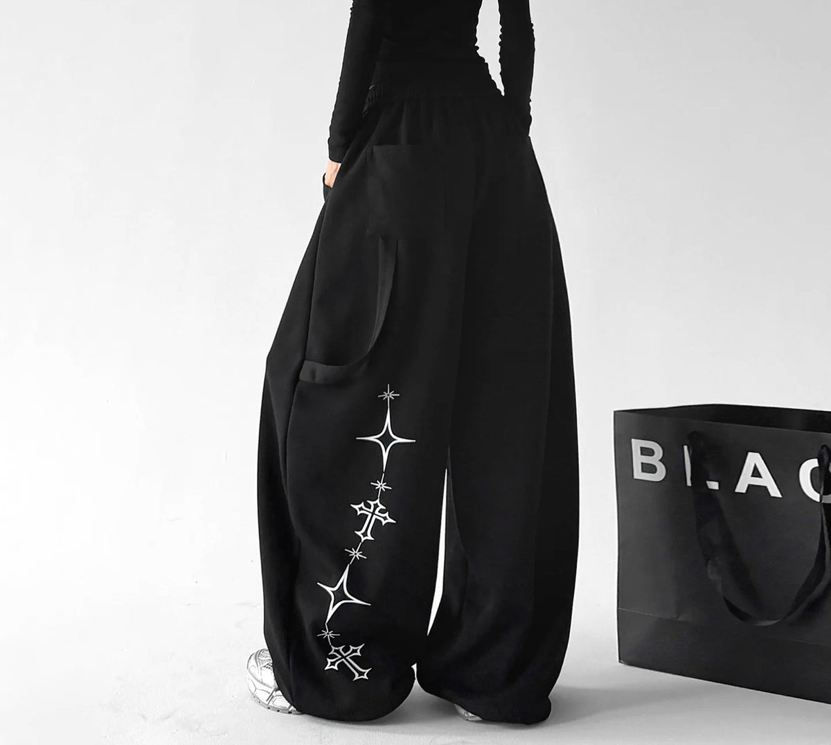Black print-detail wide-leg pants side - CT66300