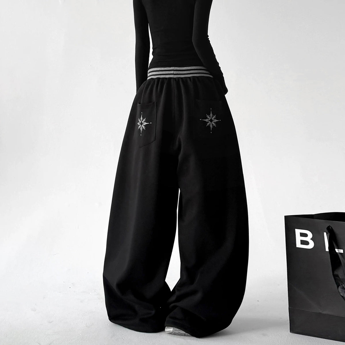 Black striped-waist wide-leg pants back - CT66304