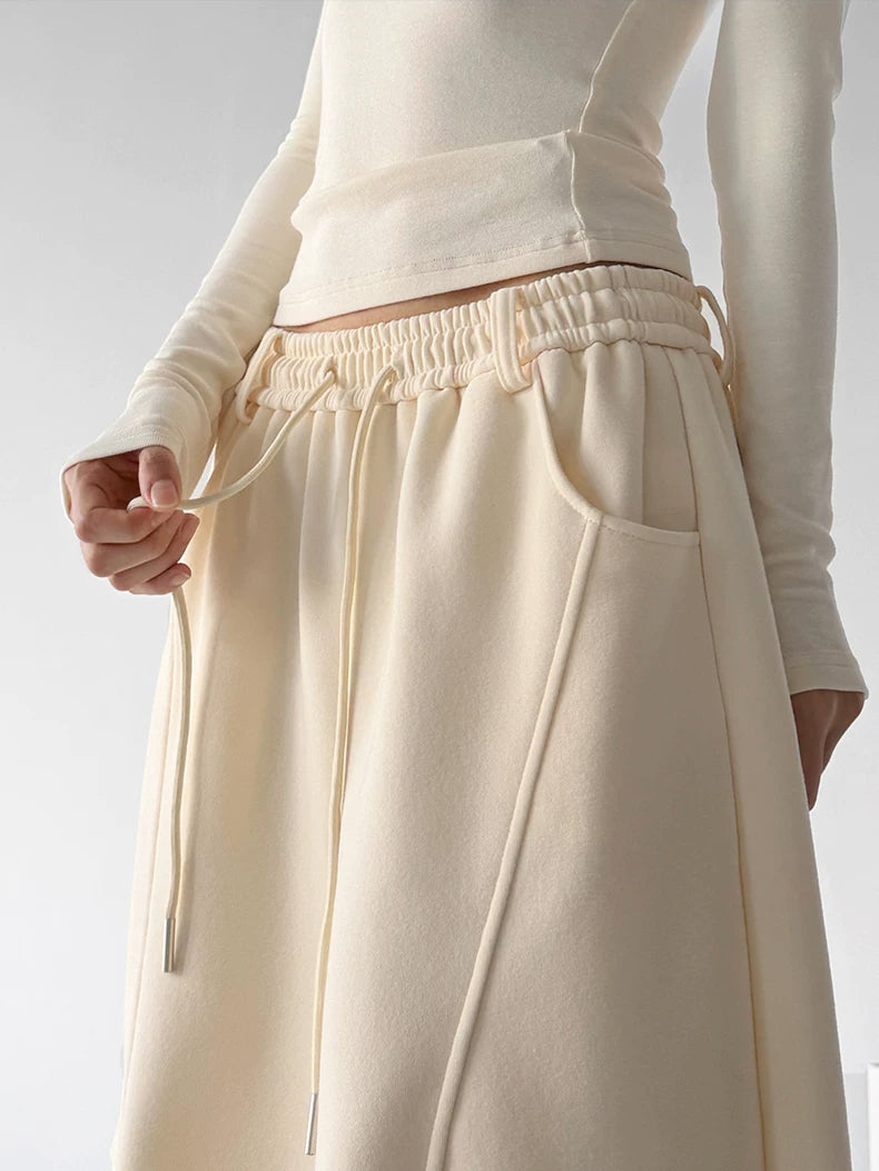 Cream seamed wide-leg pants waist detail - CT66305