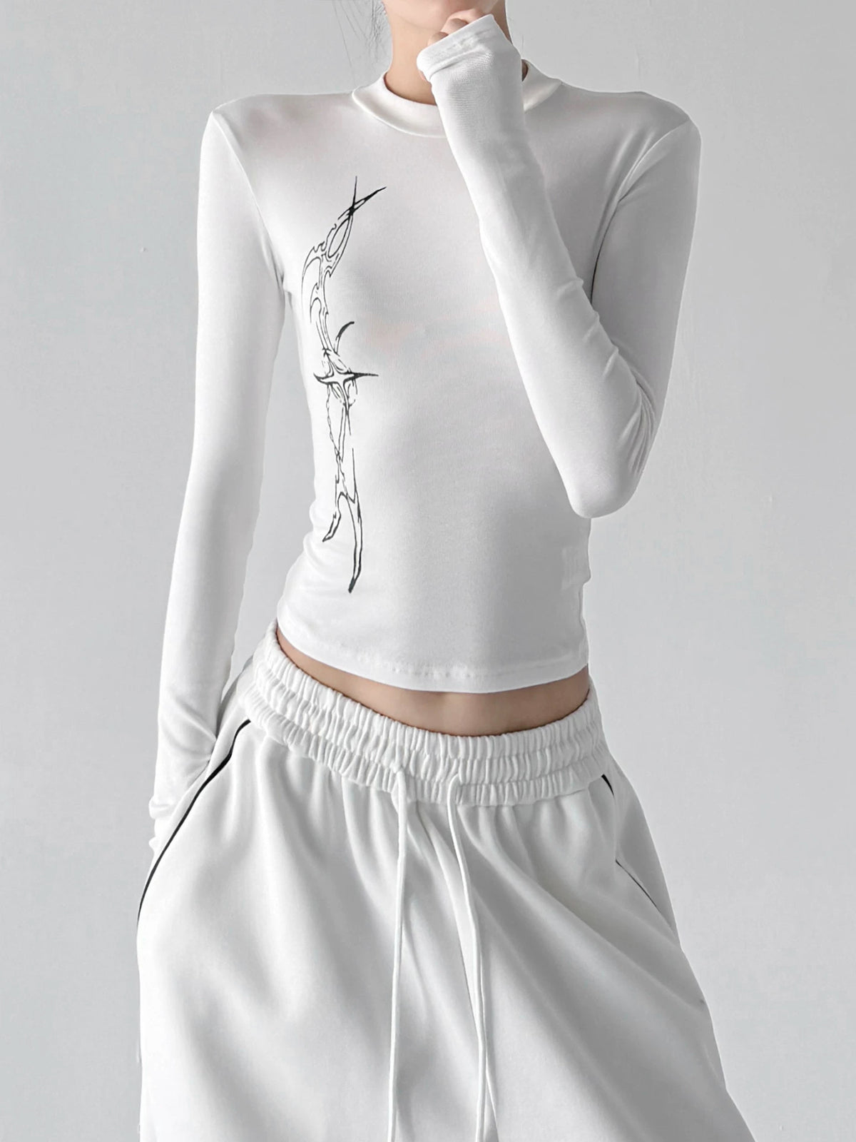 White graphic long-sleeve top sleeve detail - CT66308