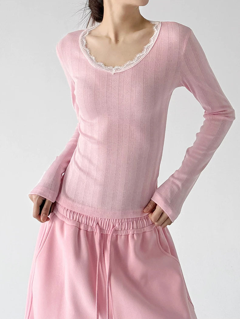 Pink lace-trim long-sleeve top front hands - CT66319