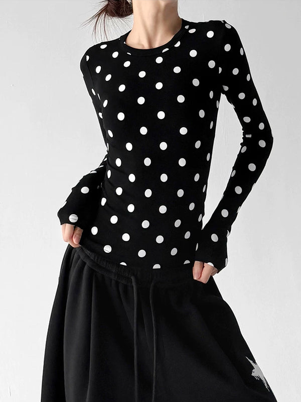 Black polka-dot long-sleeve top front hands - CT66327