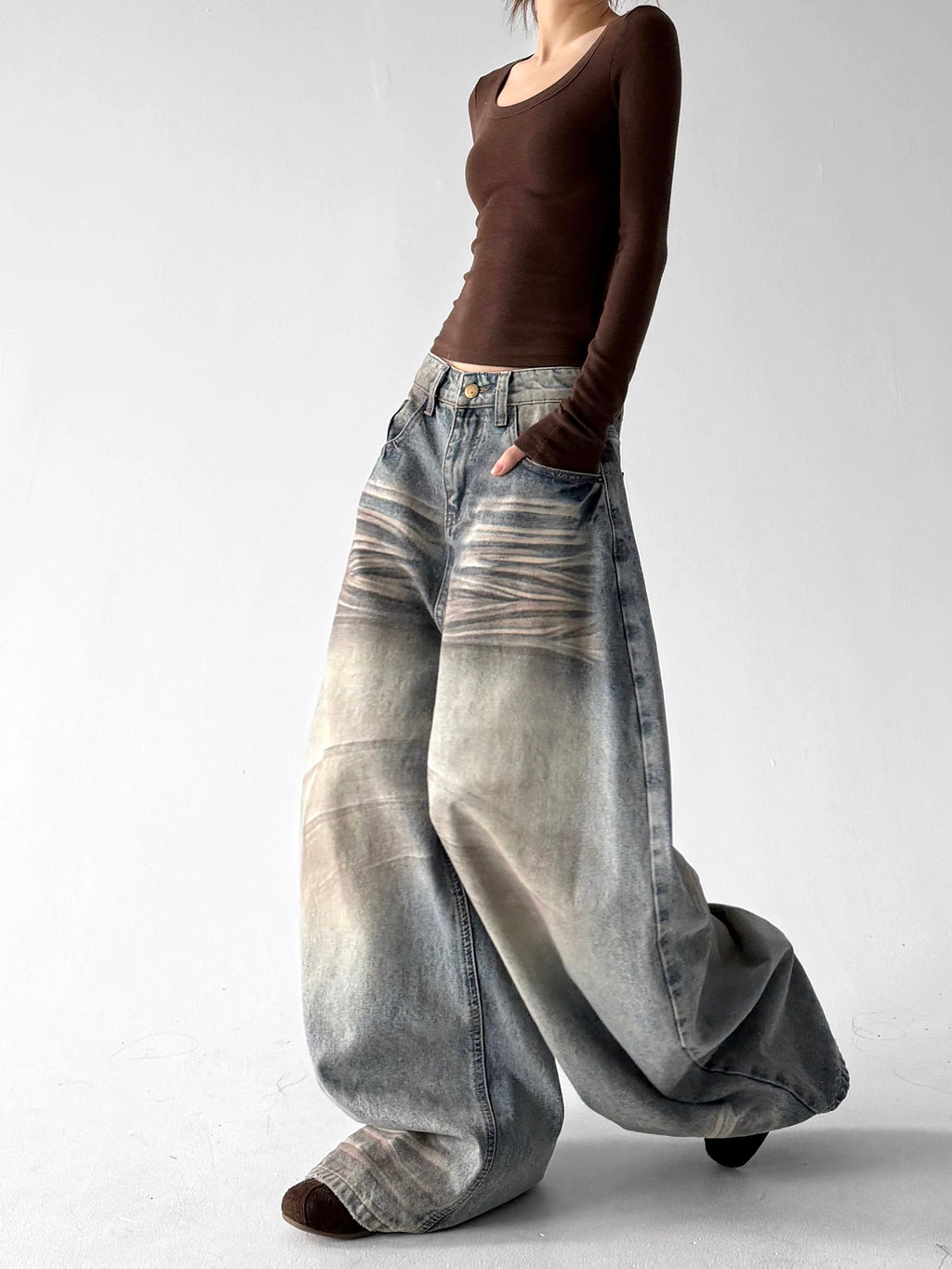 Blue washed wide leg jeans, walking view view