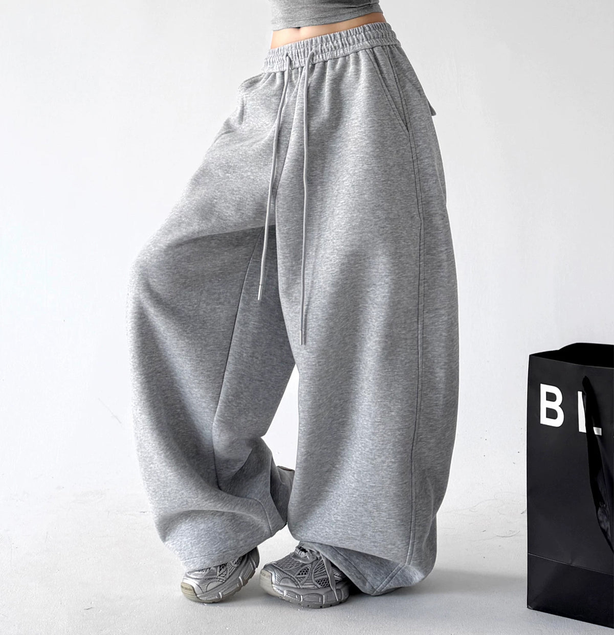 Gray drawstring wide-leg pants angled front - CT873