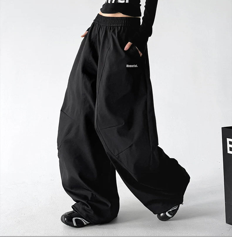 ct886 letter detail wide leg pants black walking view 24 edgefix focus v2