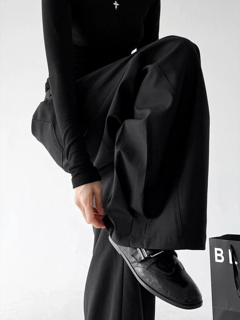Black cuff detail view of wide-leg pants