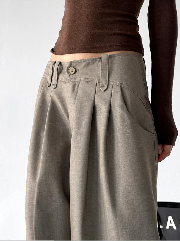 Khaki waist detail view of wide-leg pants
