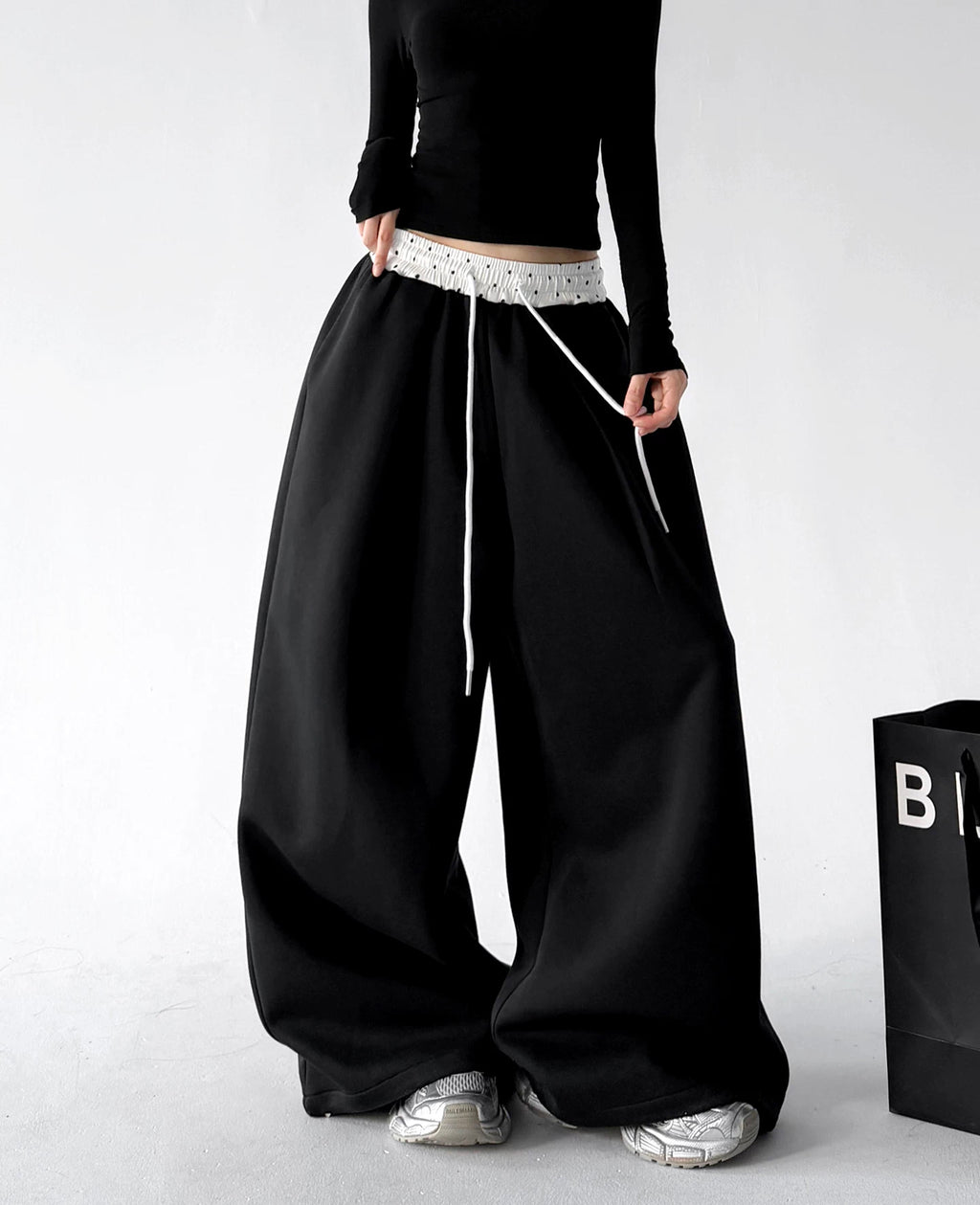Black contrast waist wide leg pants, front view