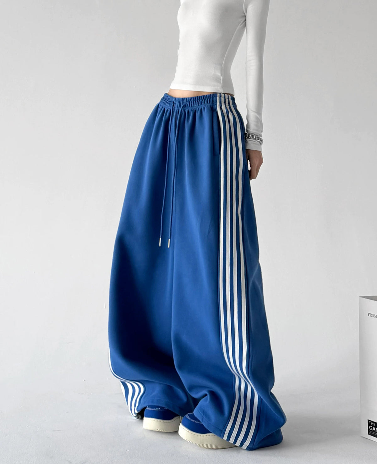 Blue wide leg pants, back view