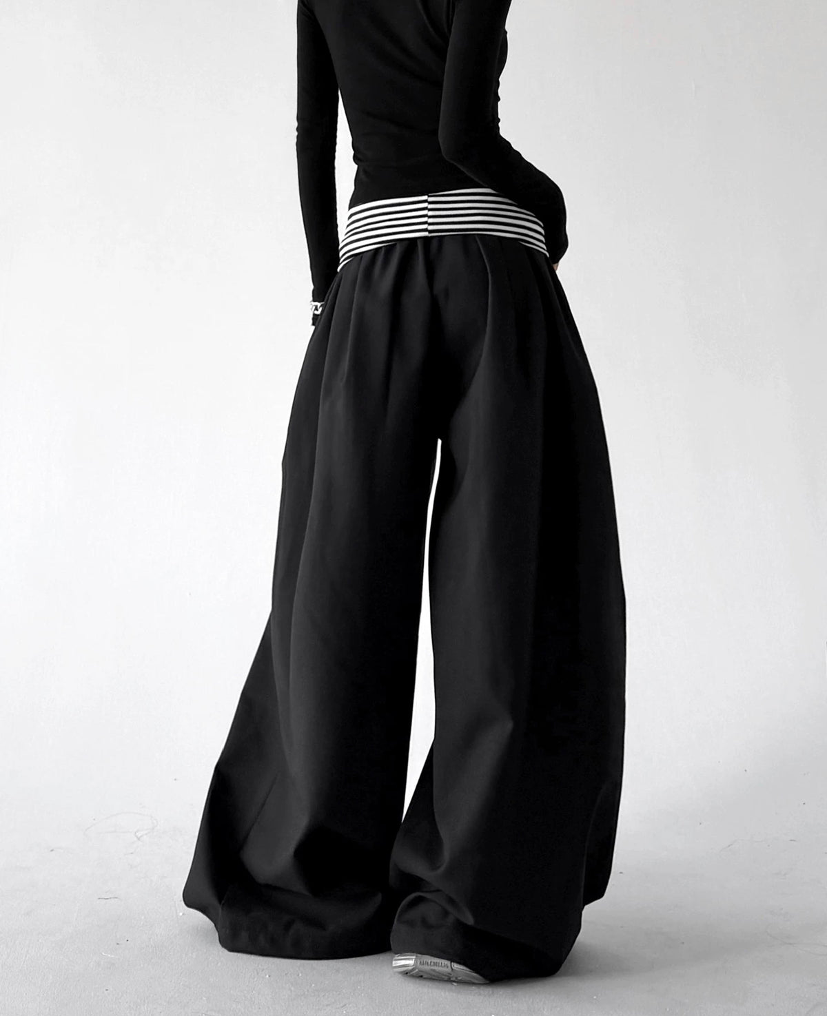 Black wide leg pants, back view