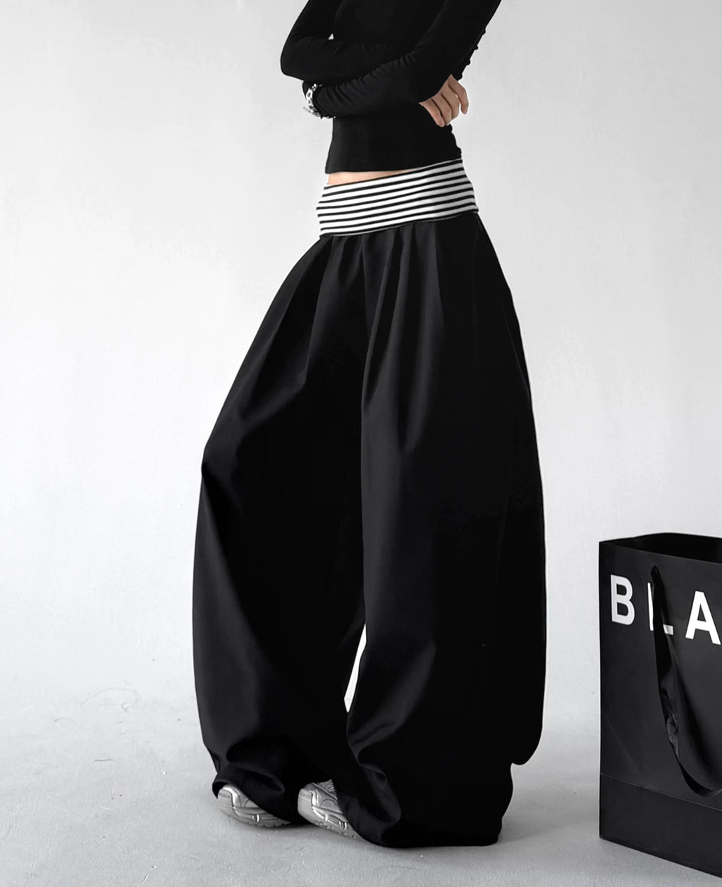 Black wide leg pants, side view