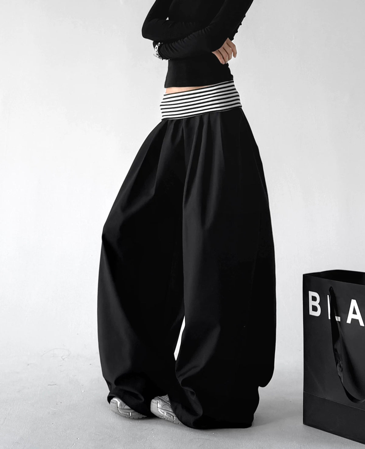 Black wide leg pants, side view