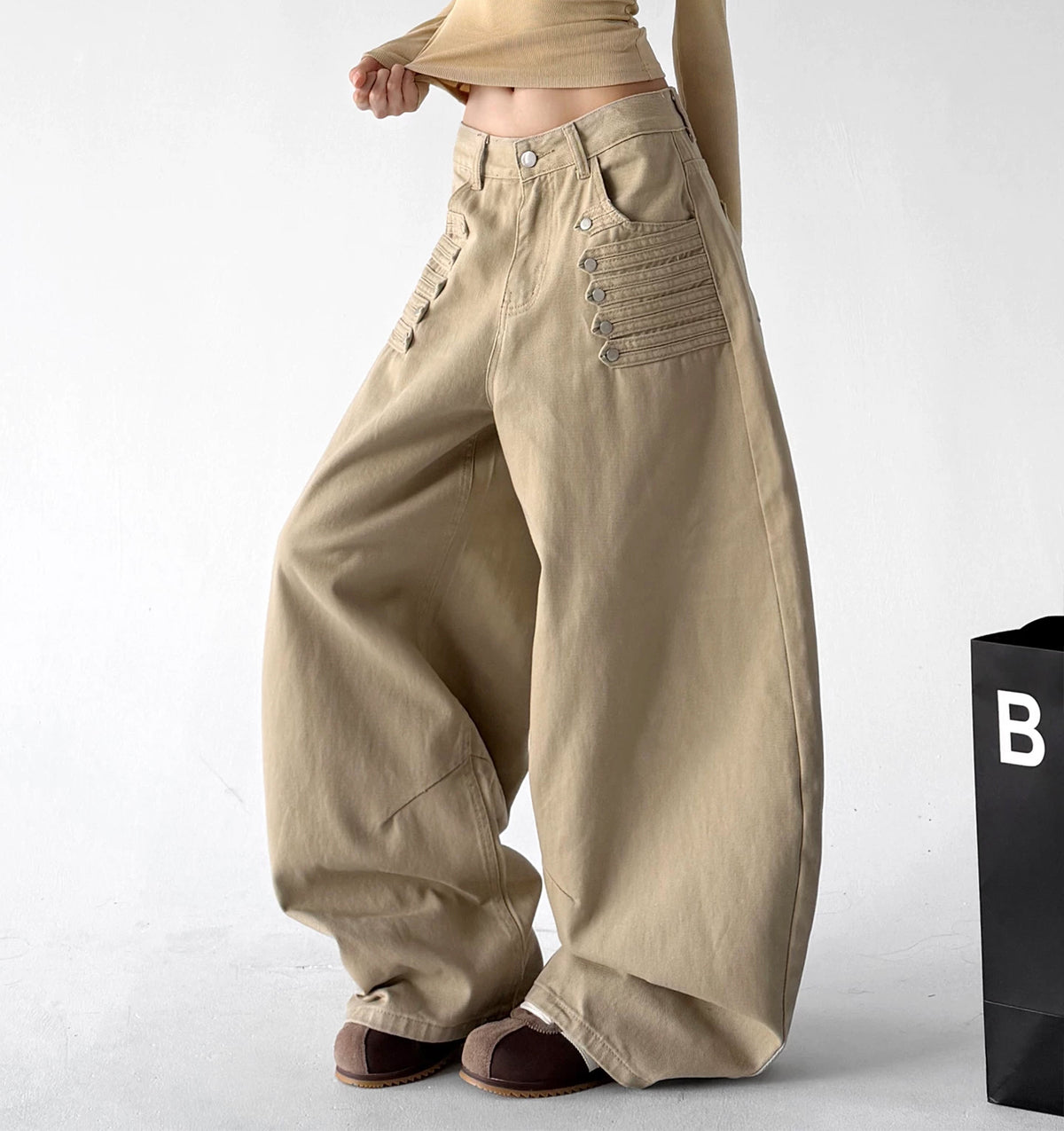 Khaki wide-leg pants, angled front view.