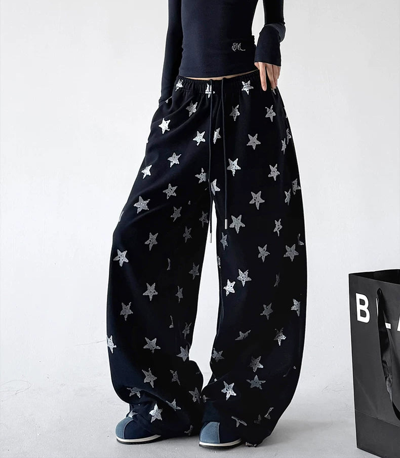 Black wide leg pants, angled front view