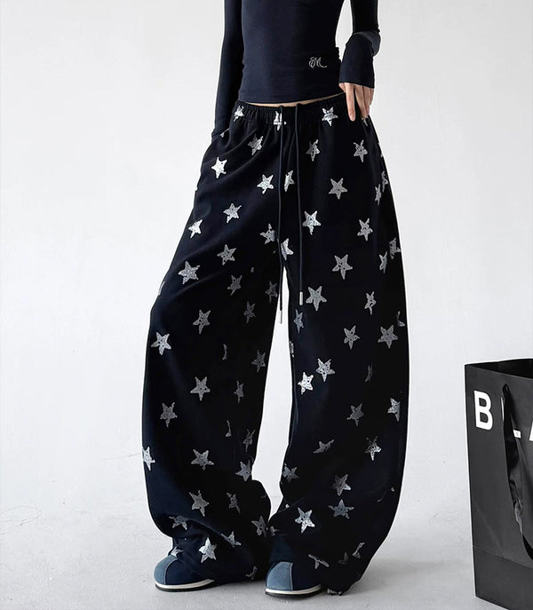 Black wide leg pants, angled front view
