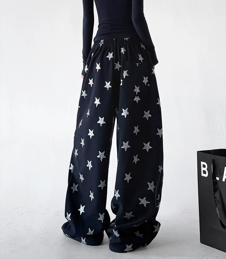 Black wide leg pants, back view