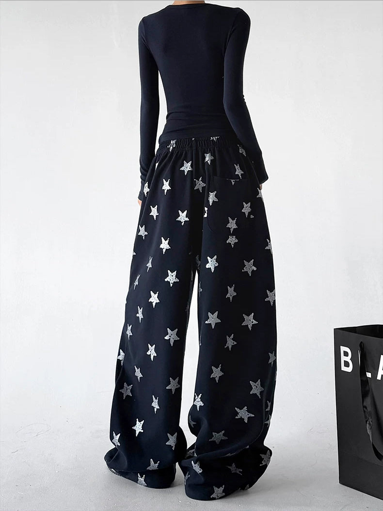 Black wide leg pants, back view