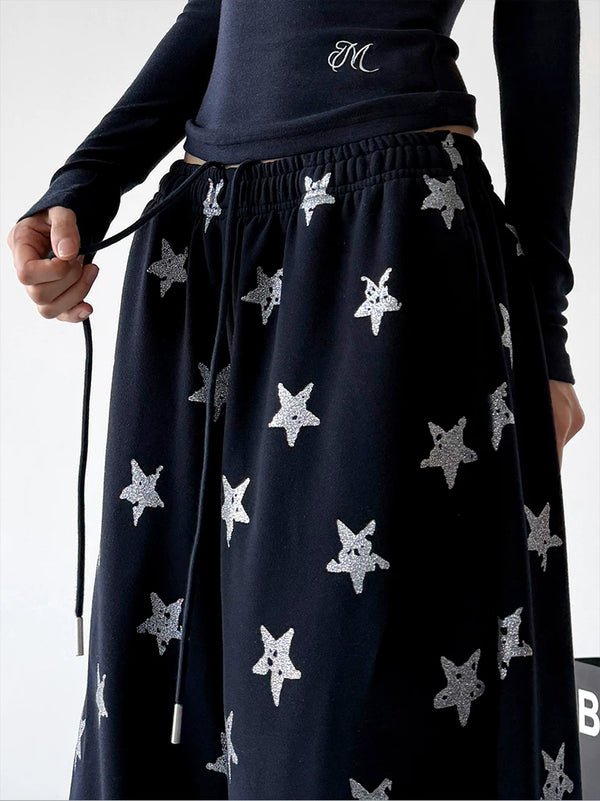 Black wide leg pants, waist detail view