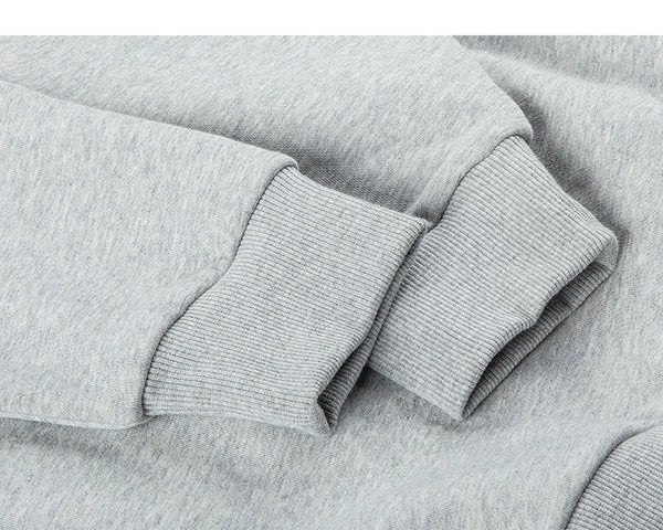 IDLT sweatshirt, heather gray ribbed cuffs.