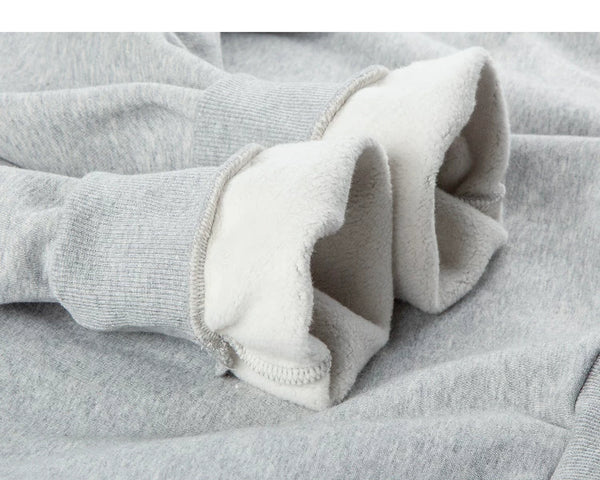 IDLT sweatshirt, heather gray fleece lining at cuffs.
