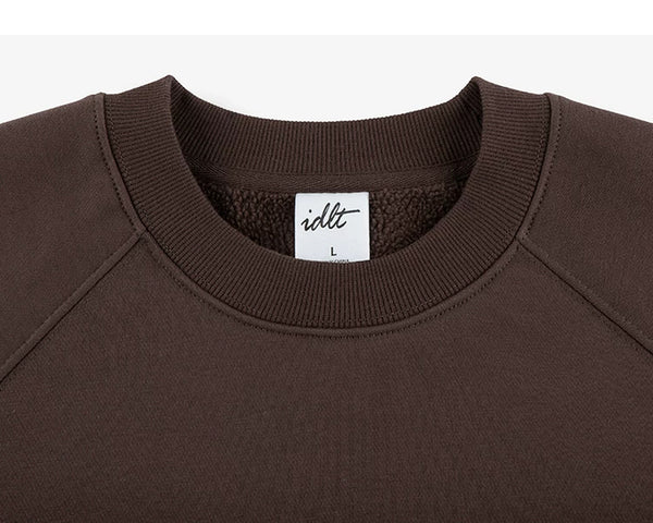 IDLT sweatshirt, brown crewneck.