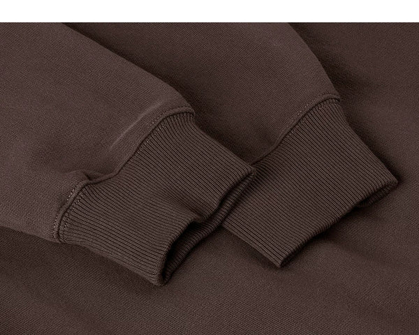 IDLT sweatshirt, brown ribbed cuffs.