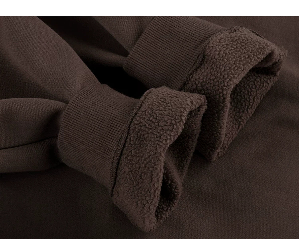 IDLT sweatshirt, brown fleece lining at cuffs.