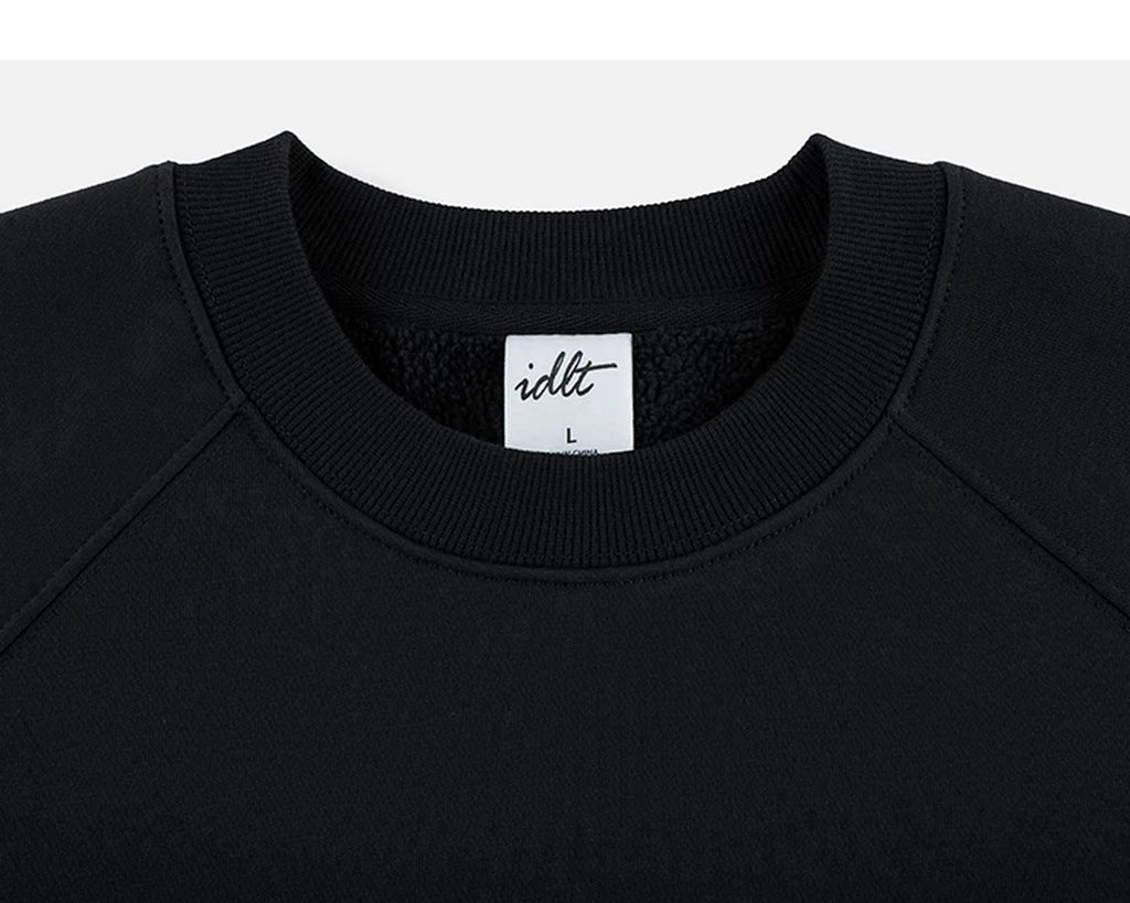 IDLT sweatshirt, black crewneck.