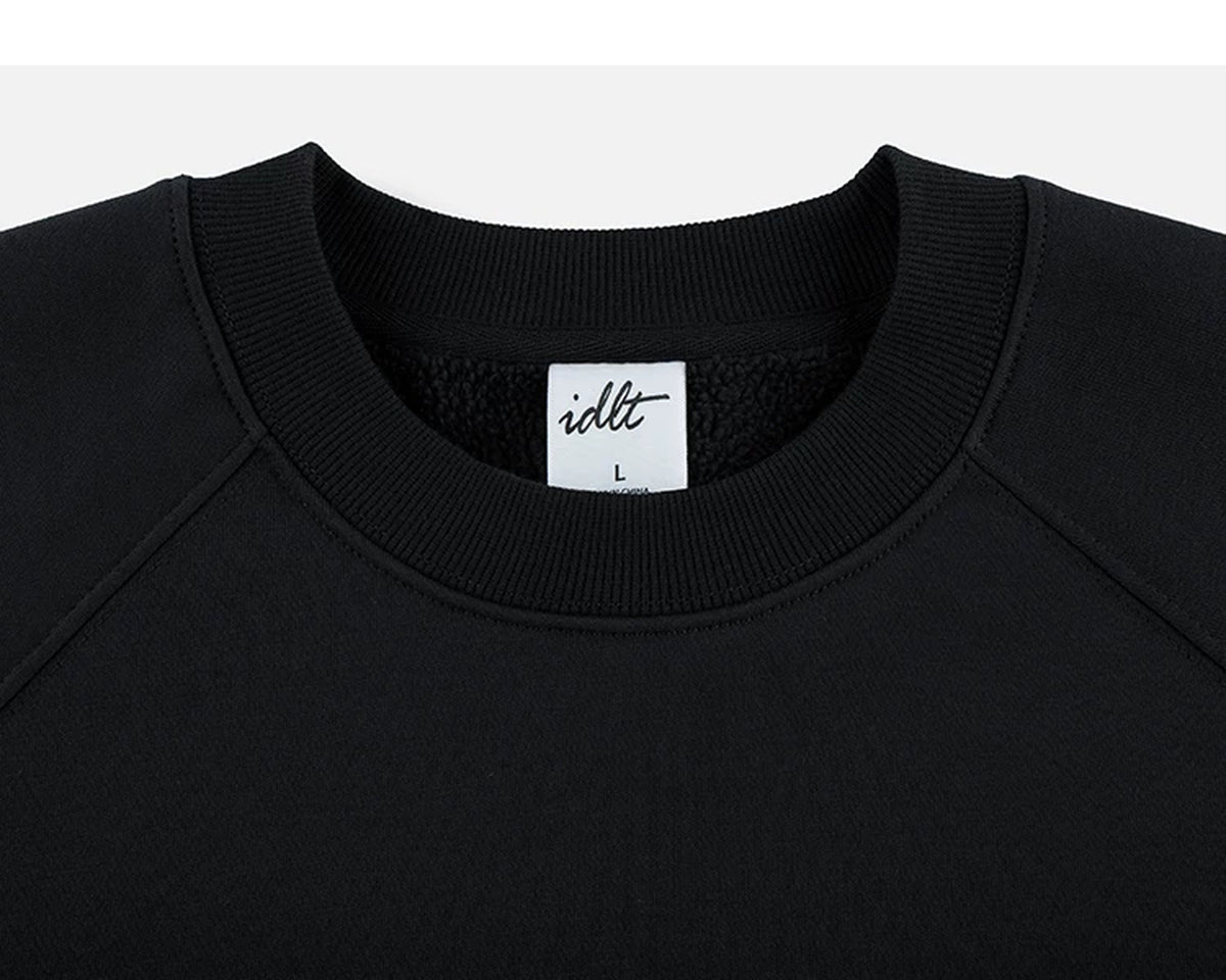IDLT sweatshirt, black crewneck.