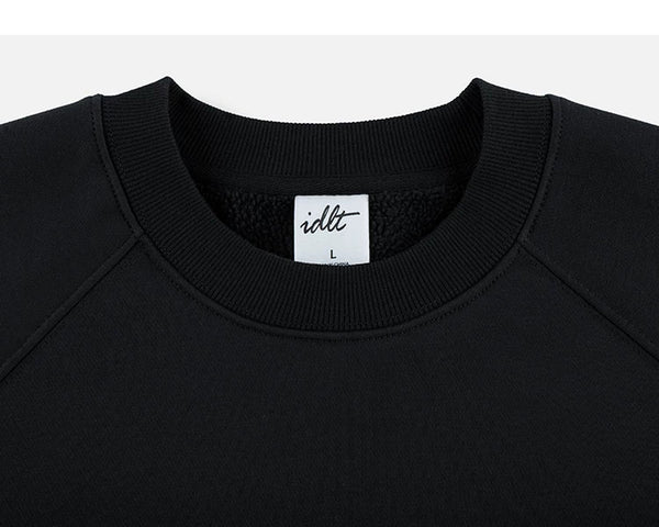 IDLT sweatshirt, black crewneck.