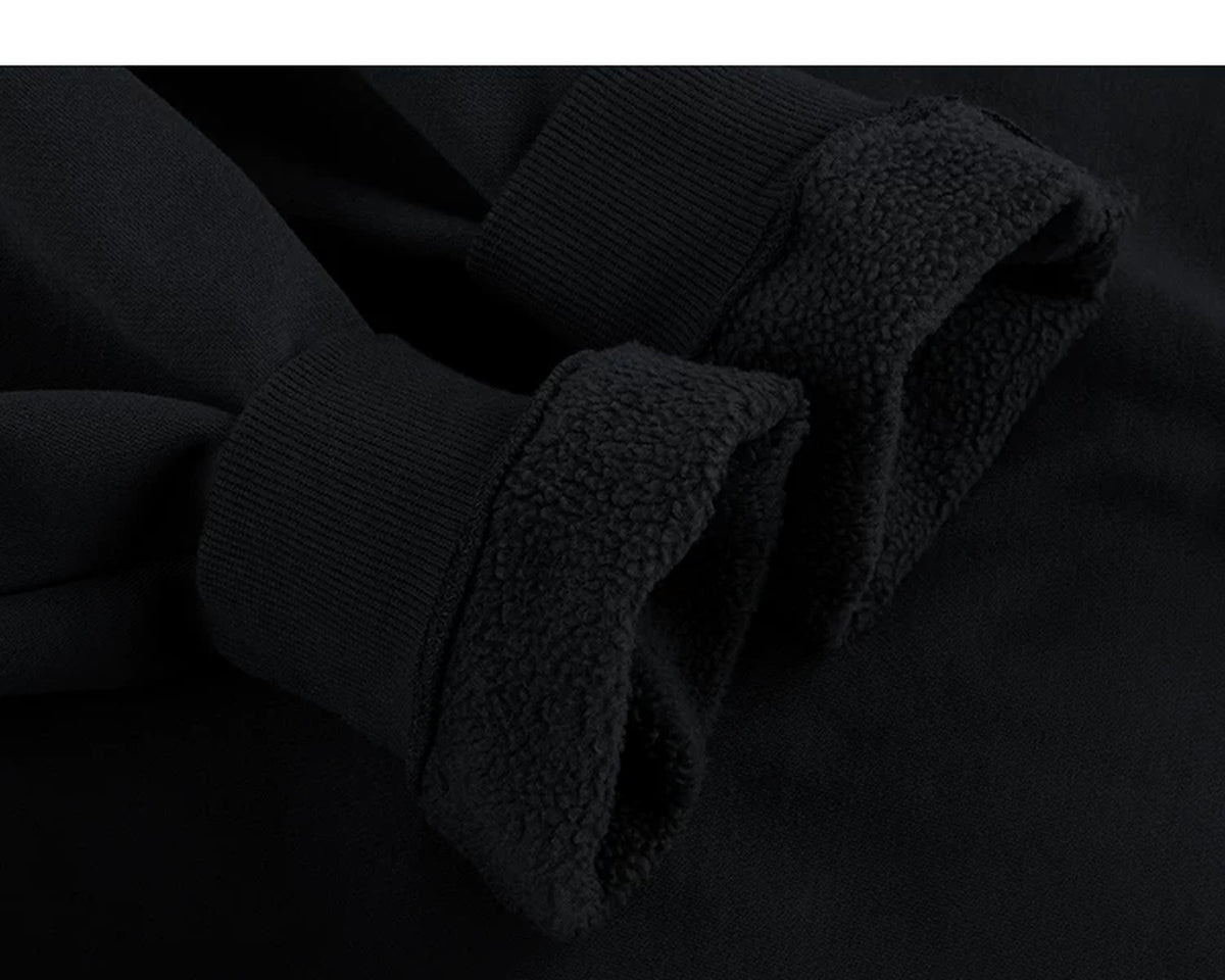 IDLT sweatshirt, black fleece lining at cuffs.