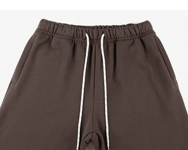 IDLT joggers, brown front waistband and pockets.